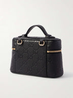 GUCCI GG Emblem mini debossed textured-leather shoulder bag