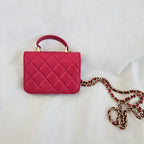 Chanel dark pink quilted lambskin top handle micro top handle flap bag