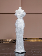 White strapless, fitted, sexy long ball gown with feather design; bridal gown R8320
