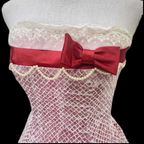 Pink strapless ball gown with a cinched waist and an A-line skirt; bridal gown R7296
