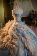 Light blue strapless, waist-cinched ball gown with a puffy skirt; bridal gown R7278