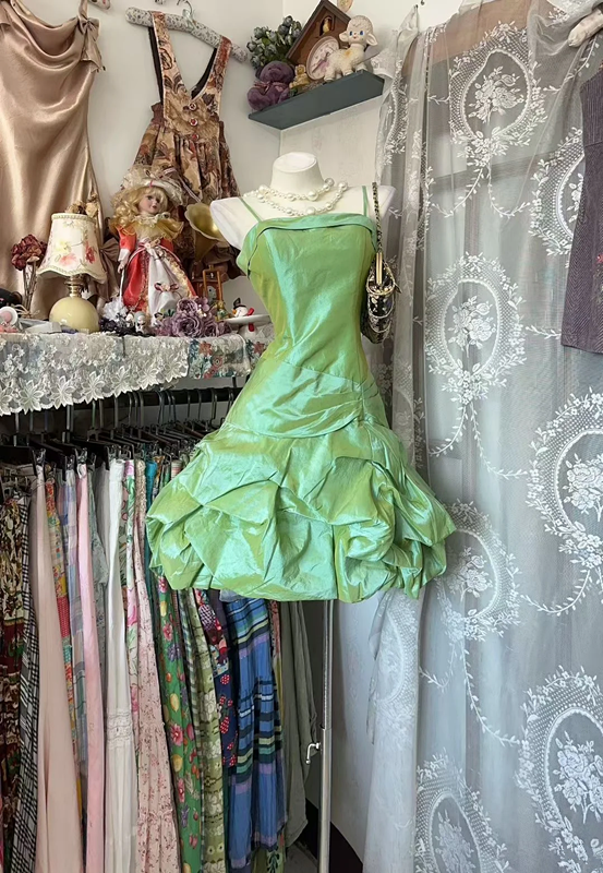 Light green halter-neck, fitted waist, short ball gown with tulip-shaped embellishments R7587
