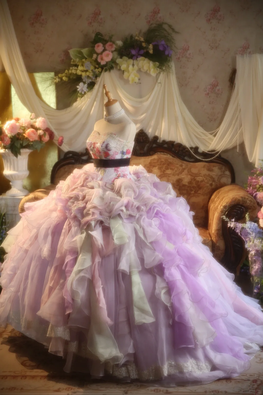 Light purple strapless ball gown with a cinched waist and a voluminous puffy skirt; bridal gown R7281