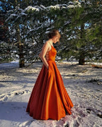 Burnt orange satin prom dress ballgown with pockets