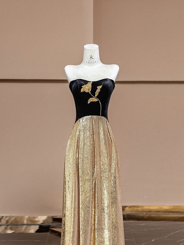 Black strapless, fitted waist, long ball gown with gold trim R8373