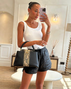 Louis Vuitton Capucines MM Bag in Black Leather and Beige Python Leather with Gold Hardware