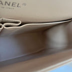 Chanel beige caviar quilted leather maxi double flap bag