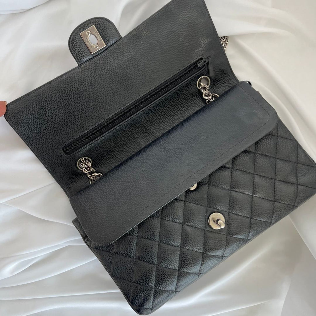 Chanel caviar black flap bag with silver hardware