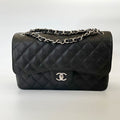 Chanel black jumbo classic flap bag