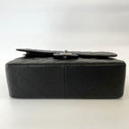 Chanel black jumbo classic flap bag